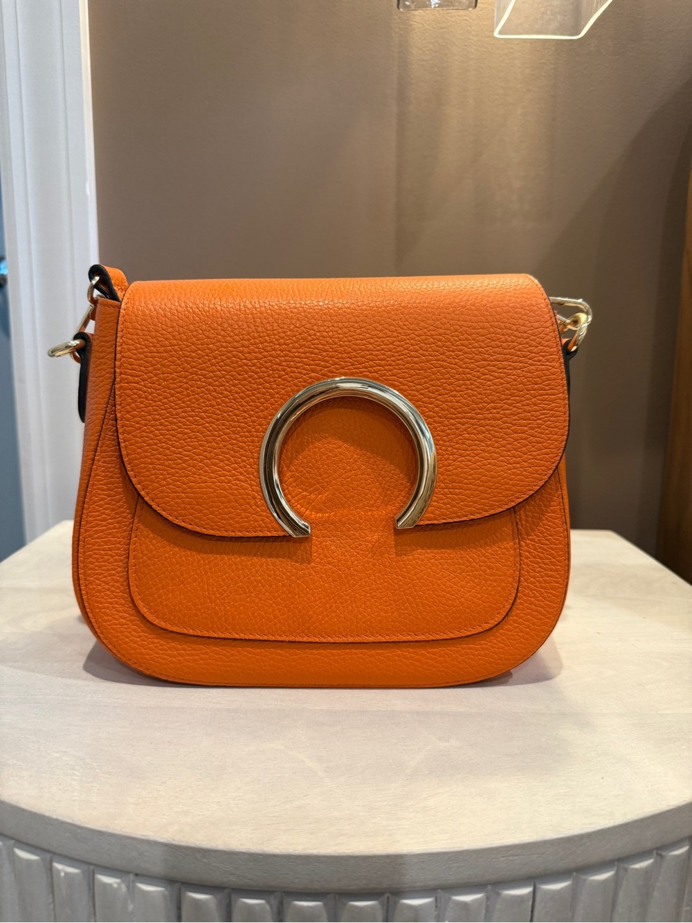 Orange Leather Crossbody Bag with Gold Ring Accent